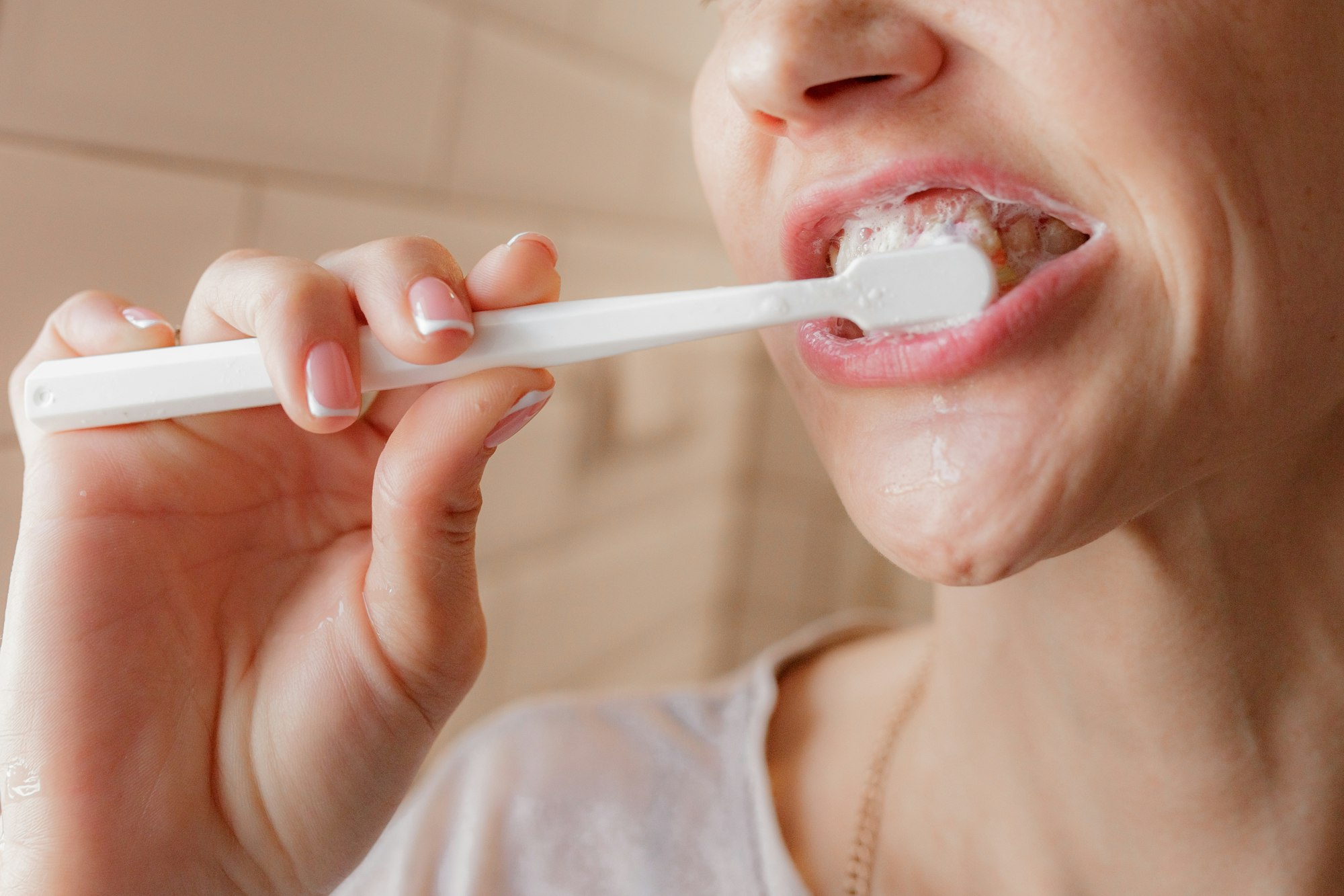 Woman Brushing Teeth